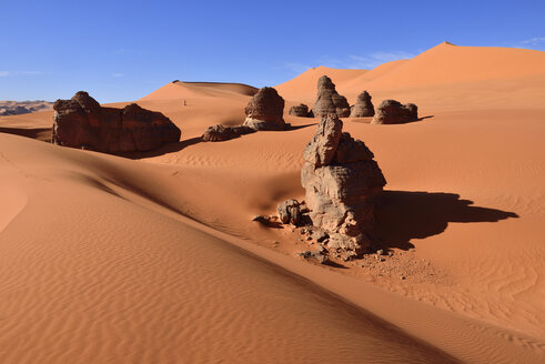 Algeria, Sahara, Tassili N'Ajjer National Park, Rock towers in the sand dunes of Tin Merzouga - ES001295