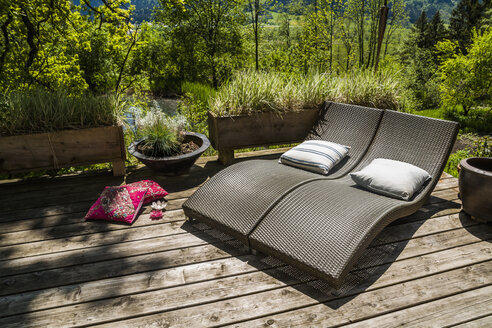 Two sun loungers on wooden terrace - TCF004148