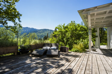 Wooden terrace in sunlight - TCF004192