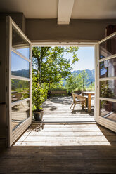 Wooden terrace in sunlight - TCF004193