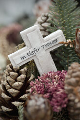 Germany, Bavaria, Ruhpolding, Grave yard, Grave cross, In deep mourning - CRF002615