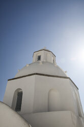 Greece, Cyclades, Santorini, view to part of a white church at back light - KRPF000845