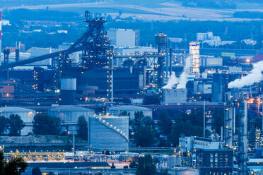 Austria, Upper Austria, Linz, Industrial area in the evening, Blue hour - EJWF000473