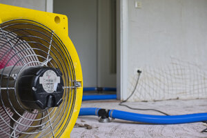 Dehumidifier at work in an apartment which is damaged by flooding - LAF001045