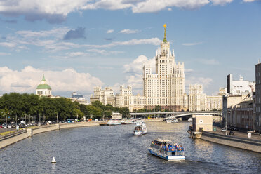 Russia, Central Russia, Moscow, Moskva river and excursion boats, Seven Sisters in the background - FOF006814