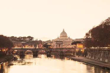 Italy, Rome, St. Peter's Basilica and Ponte Sant'Angelo in the evening - GW003117