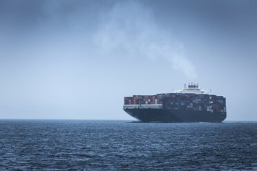 Spain, Andalusia, Tarifa, Cargo ship - KBF000115