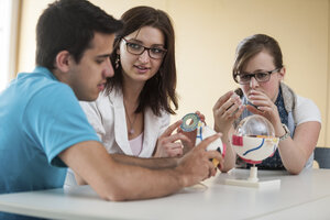 Vocational school students with eye model - PAF000827