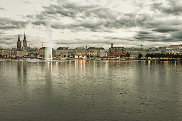 Germany, Hamburg, Inner Alster and Alster fountain in the evening - KRPF001015