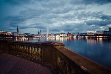 Germany, Hamburg, Inner Alster and Alster fountain in the evening - KRPF001019