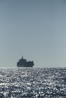 Spain, Andalusia, Tarifa, Cargo ship - KBF000143