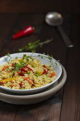 Vegetable stir-fry with millet on plate - MYF000533