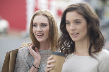 Portrait of two female friends on shopping tour - ZEF000076
