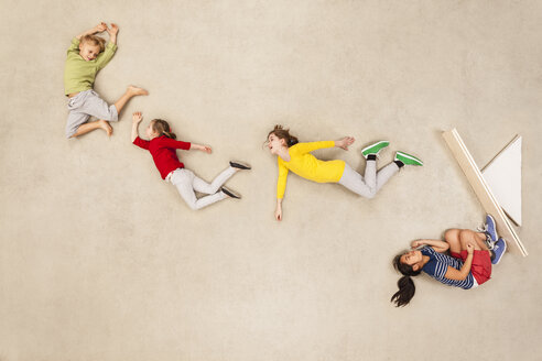 Children doing somersaults on seesaw - BAEF000900