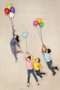 Children flying away on balloons - BAEF000905