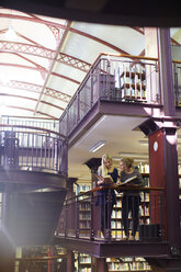 Two female students learning in a library - ZEF000126