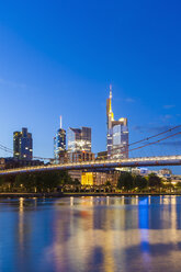 Germany, Hesse, Frankfurt, view to Main River and lighted financial district in the background - WDF002596