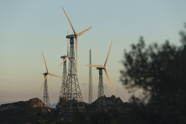 Spain, Andalusia, Tarifa, Wind farm in the evening - KBF000150