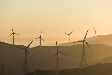 Spain, Andalusia, Tarifa, Wind farm in the evening - KBF000153