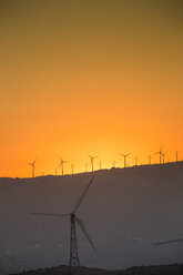 Spain, Andalusia, Tarifa, Wind farm at sunset - KBF000167