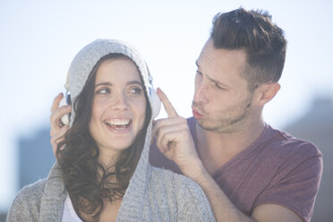 Portrait of couple with headphones - ZEF000775