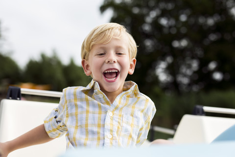 Portrait of laughing little boy stock photo