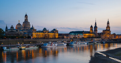 Germany, Saxony, Dresden, View of Academy of Fine Arts, Bruehl's Terrace, Sekundogenitur, Hausmann Tower, House of the Estates and Dresden Cathedral with Elbe waterfront in the evening - WGF000424