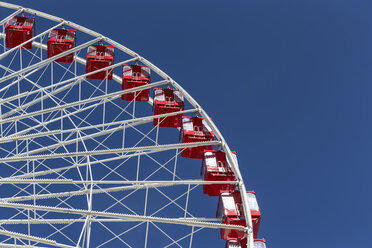 Ferris wheel against blue sky - FOF007134