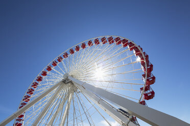 Ferris wheel against blue sky - FOF007141