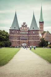 Germany, Schleswig-Holstein, Luebeck, Holsten Gate, Saint Peter's Church in the background - KRPF001027