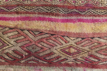 Morocco, Marrakesh, detail of a traditionally Moroccan carpet - KMF001477