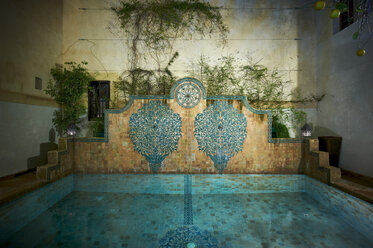 Morocco, Fes, Hotel Riad Fes, pool by night - KMF001428