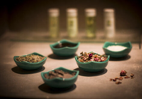 Morocco, Fes, Hotel Riad Fes, bowls of dried rose blossoms and herbs in a bathroom - KMF001434