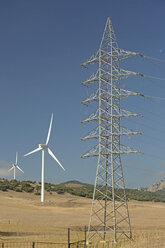 Spain, Andalusia, Tarifa, Wind farm and power pylon - KBF000171