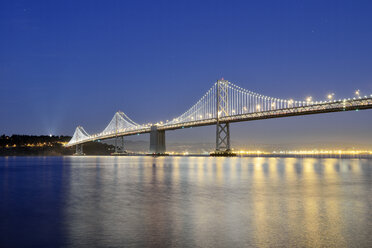 USA, California, San Francisco, Oakland Bay Bridge and Yerba Buena Island at night - BRF000702