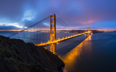 USA, California, San Francisco, skyline and Golden Gate Bridge at the blue hour seen from Hawk Hill - FOF007044