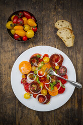 Dish of tomato salad made of different heirloom tomatoes - LVF001860