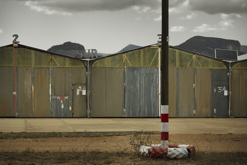 Spain, Majorca, old shacks in deserted landscape - KOF000044