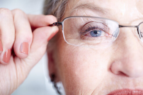 Close-up of senior woman wearing glasses - ZEF000631