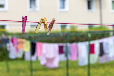 Austria, Clothesline with clothes pegs - EJWF000601