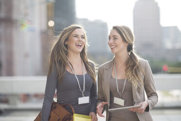 Two laughing businesswomen - ZEF000240