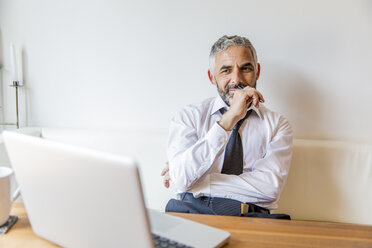 Portrait of businessman at his home office - MBEF001151