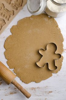 Gingerbread dough with gingerbread man cookie cutter - ODF000838