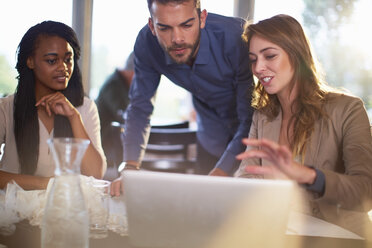 Business meeting of three people in a restaurant - ZEF000897