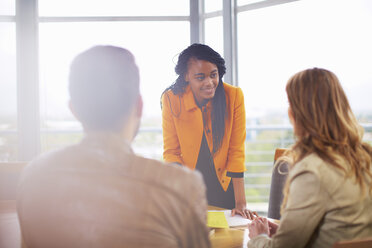 Three people at business meeting - ZEF000913