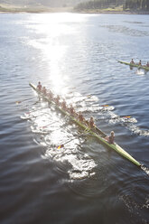 Elevated view of two rowing eights in water - ZEF000485