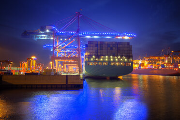 Germany, Hamburg, Cruise Days, Port of Hamburg, container harbour, container ship at night - ROM000016