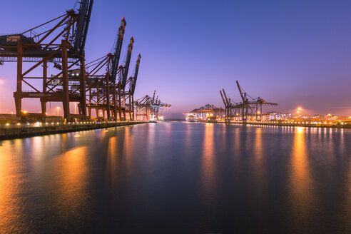 Germany, Hamburg, Port of Hamburg, Container Terminal Burchardkai in the evening - RJ000286