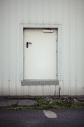 Curious small door of an industrie building - DWF000179