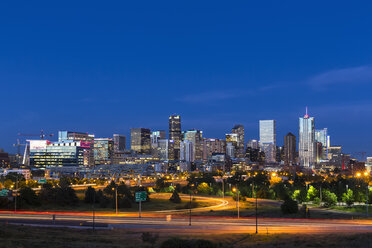 USA, Colorado, Denver, Cityscape and Interstate Highway in the evening - FOF007197